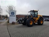 2022 JCB 427 AGRI wheel loader, three-quarter front view