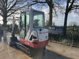 2020 Takeuchi TB225 mini excavator, rear three-quarter view