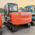 2024 Hitachi ZX60-5G excavator, rear three-quarter view