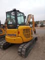 2024 Komatsu PC55MR-5 mini excavator, rear three-quarter view