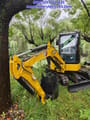 2023 Caterpillar 303.5 mini excavator, side view