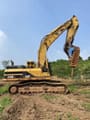 2006 Caterpillar 345B L crawler excavator side view with hydraulic hammer