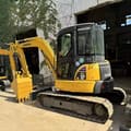 2023 Komatsu PC-55MR mini excavator, side profile view