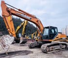 Case CX240B crawler excavator, side view