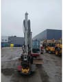 2018 Takeuchi TB290 mini excavator, front view with boom raised