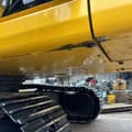 Komatsu PC300 crawler excavator undercarriage view