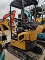 2026 XCMG XE17U Mini Excavator showing the full yellow body and black tracks from a three-quarter view.