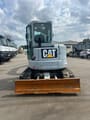 2017 Caterpillar 305E2 mini excavator, front view with blade