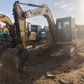 2023 Caterpillar 307E2 mini excavator, front three-quarter view