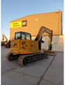 2023 Caterpillar 308 crawler excavator, rear three-quarter view