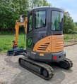2022 CASE CX26C mini excavator, rear three-quarter view