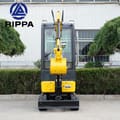 2026 Rippa R319 Mini Excavator from the rear, showcasing the compact dark grey counterweight and yellow boom.