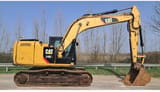 2014 Caterpillar 318E L crawler excavator, side view