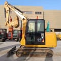 2023 Caterpillar 305.5E mini excavator, side profile view