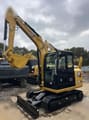 2024 Caterpillar 306E2 crawler excavator, front three-quarter view