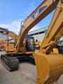 2015 Caterpillar 320BL crawler excavator, front three-quarter view