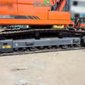 2020 Doosan DX225LC crawler excavator side view of the undercarriage