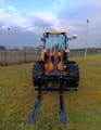 2024 JCB 407 SV wheel excavator front view with pallet forks