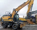 2016 Hyundai HW140 wheel excavator, side view