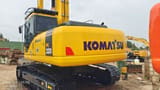 2023 Komatsu PC220-7 crawler excavator, rear three-quarter view
