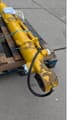 2022 Komatsu PC210LC-10 bucket cylinder, close-up view