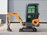 2025 Müller Machinery MB 12-KS H Mini Excavator, side view, with the boom and bucket positioned close to the tracks.