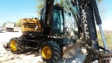 2006 Mecalac 714 MW wheel excavator, side view
