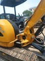2023 Caterpillar 304CCR mini excavator cab and boom detail
