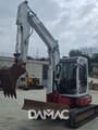 2007 Takeuchi TB153 mini excavator, front three-quarter view
