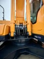 Hyundai 220-9S crawler excavator boom cylinders close-up