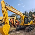 2014 Komatsu PC300 crawler excavator, front three-quarter view