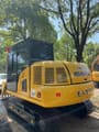 2024 Komatsu PC70-8 mini excavator rear three-quarter view