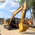2023 Caterpillar 320GC crawler excavator, front three-quarter view