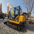 2024 Komatsu PC56 excavator, rear three-quarter view