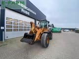 2007 CASE 621D wheel loader, front three-quarter view