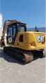 2021 Caterpillar 313-07GC crawler excavator, rear three-quarter view
