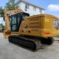 Caterpillar 320E crawler excavator, rear three-quarter view