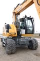 2023 Liebherr A916 Compact Litronic wheel excavator, front three-quarter view