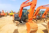 Hitachi ZX60 mini excavator, front three-quarter view
