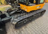 2024 JCB 86C-2 mini excavator side view of tracks and cab