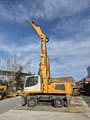 2015 Liebherr LH30 M material handler, side profile view