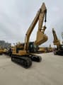 2023 Caterpillar 320GC crawler excavator, front three-quarter view