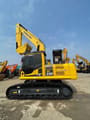 2024 Komatsu PC220 LC crawler excavator, side profile view