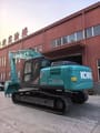 2025 Kobelco SK210LC excavator, rear three-quarter view