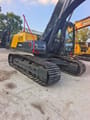 2024 Volvo EC210D crawler excavator, rear three-quarter view