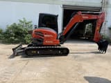 2019 Kubota KX057-4 mini excavator, side profile view