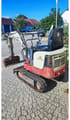 2009 Takeuchi TB108 mini excavator, rear three-quarter view