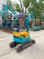 2020 Kubota U17 mini excavator, rear three-quarter view