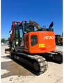 2019 Hitachi ZX135US-6 crawler excavator, rear three-quarter view