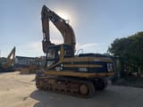 2015 Caterpillar 320BL crawler excavator, rear three-quarter view